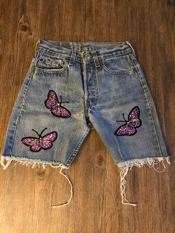 purple levi shorts