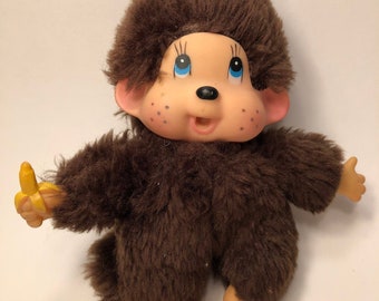 old monkey toy with banana