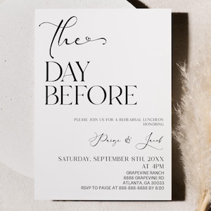 May include: A white invitation card with black text announcing "The Day Before" a rehearsal luncheon for Paige & Jack. The event is scheduled for Saturday, September 8th, 20XX at 4 PM at Grapevine Ranch, 8888 Grapevine Rd, Atlanta, GA 30033. RSVP to Paige at 888-888-8888 by 8:20.