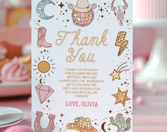 May include: A white rectangular birthday thank you card featuring gold glitter text that reads Thank You and pink text that reads LOVE, OLIVIA. The card is decorated with colorful illustrations of a disco ball, cowboy hat, boot, cactus, and stars.