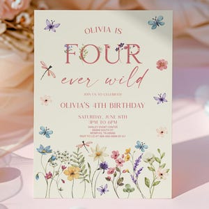 May include: A floral-themed birthday invitation with the text "Olivia is Four Ever Wild." The invitation features watercolor illustrations of flowers, butterflies, and dragonflies. The invitation is on a light beige background with pink and purple text.