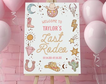 May include: A white rectangular sign on a wooden easel featuring the text 'WELCOME TO TAYLOR'S Last Rodeo' and '07.14.XX-07.16.XX'. The sign is decorated with illustrations of a disco ball cowboy hat, moon, boot, sun, diamond, horseshoe, skull, lightning bolt, star, and cactus.