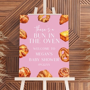 ¡Hay un bollo en el horno! Letrero rosa de bienvenida para baby shower / Póster de caballete editable con pan, bollos, croissants y galletas, tablero de espuma minimalista B68