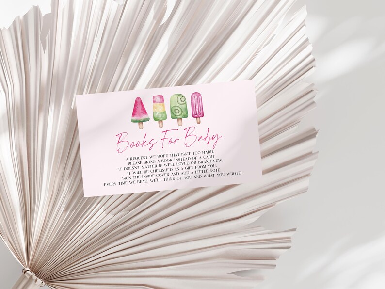May include: A pink baby shower invitation card with watercolor illustrations of four ice pops. The text "Books For Baby" is written in a cursive font. The card's message requests guests to bring a book instead of a card.