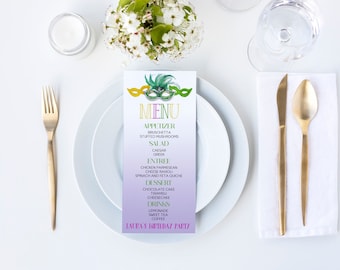 May include: A purple, green, and gold menu card with a Mardi Gras mask design. The menu lists appetizers, salads, entrees, desserts, and drinks. The text at the bottom reads "Laupa's Birthday Party".