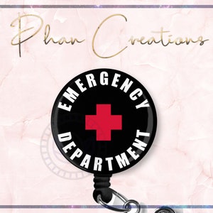 May include: Black and white retractable badge holder with a red cross and the text "EMERGENCY DEPARTMENT".