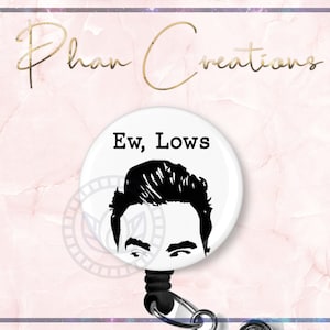 May include: White retractable badge holder with a black and white image of a man's face and the text "Ew, Lows".