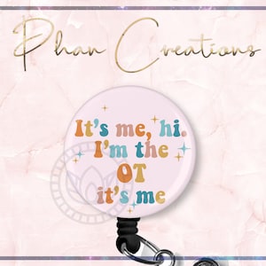 May include: A white retractable badge holder with a pink background and the text "It's me, hi. I'm the OT it's me" in colorful retro font.
