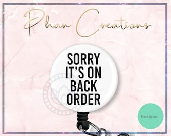 May include: White retractable badge holder with a black and white round button that says "SORRY IT'S ON BACK ORDER". The badge holder is a best seller.