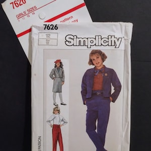 May include: A Simplicity sewing pattern for girls' clothing, pattern number 7626, sizes 8-14. The pattern shows three different outfits, including a blue blazer and pants, a red skirt and a white blouse, and a red pair of pants and a white blouse.