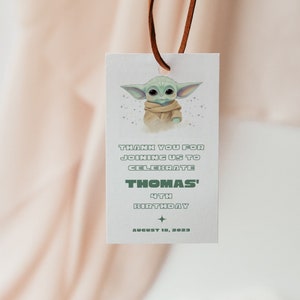 May include: A white thank you tag with a green cartoon character, a green star, and the text "Thank you for joining us to celebrate Thomas' 4th Birthday August 10, 2023".