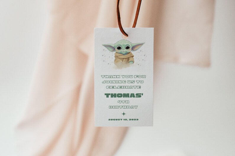 May include: A white thank you tag with a green cartoon character, a green star, and the text "Thank you for joining us to celebrate Thomas' 4th Birthday August 10, 2023".