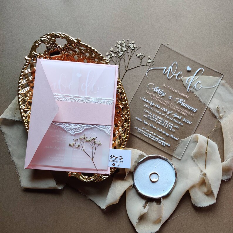Acrylic wedding invitation with blush envelope lace and vellum wrapper