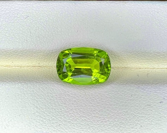 Natural Peridot 12.1x8.4x6 mm cushion shaped gemstone, weight-4.93 carats, neon green colour, Pakistan mines peridot, Quality- VS