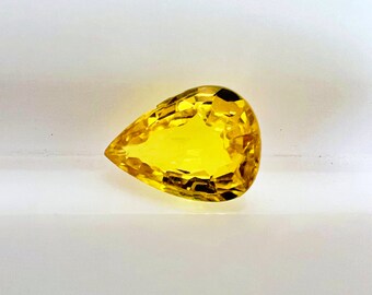 Natural Yellow Sapphire 7x5mm pear shaped gemstone, weight- 0.82 carats, lemon yellow colour, Quality- VS, HEATED beryllium, loose gemstone
