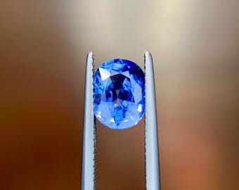 Natural Blue Sapphire 2.73 carats oval shaped faceted gemstone, No heat, Ceylon Sapphire, Dimensions- 9.36x7.38x4.72 mm, Certified
