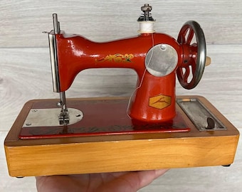 Vintage Children's Sewing Machine: Orange Metal USSR Toy, 1970s