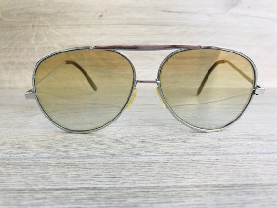 Occhiali da sole store uomo anni 70