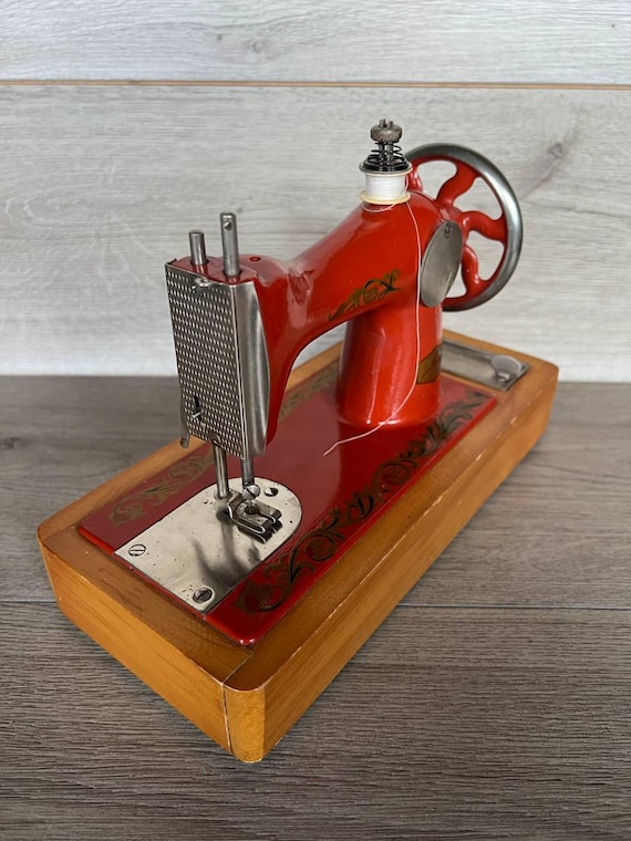 Vintage Children's Sewing Machine: Orange Metal USSR Toy, 1970s