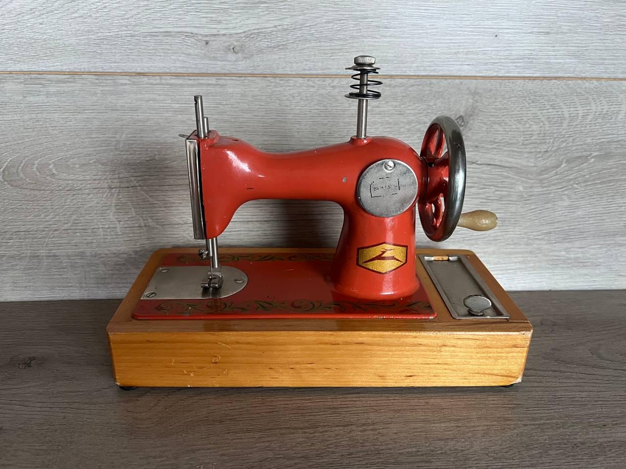 Vintage Children's Sewing Machine: Orange Metal Mini Toy, USSR