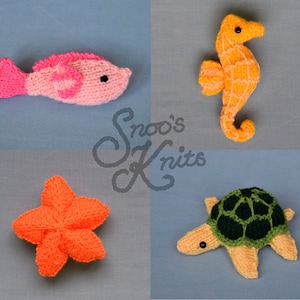 May include: A set of four knitted sea creatures: a pink fish, an orange starfish, a yellow seahorse, and a green and orange turtle.  The creatures are all handmade and have a whimsical, childlike charm.