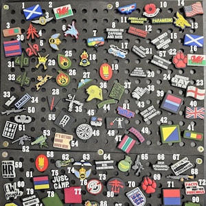 May include: A collection of 90 colourful square patches with various designs and text. The patches are arranged in a grid pattern on a black background. Some of the patches feature text such as "Running on Caffeine and Hate", "Sounds Gay I'm In", "Just Camp", and "Facts Don't Care About Your Feelings".