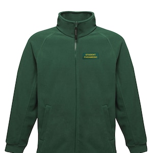 May include: A dark green fleece jacket with a zipper closure and a patch on the left chest that reads "STUDENT PARAMEDIC".