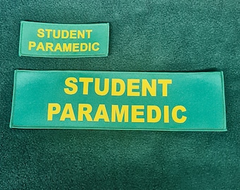 May include: Two green rectangular patches with yellow text that reads "STUDENT PARAMEDIC".