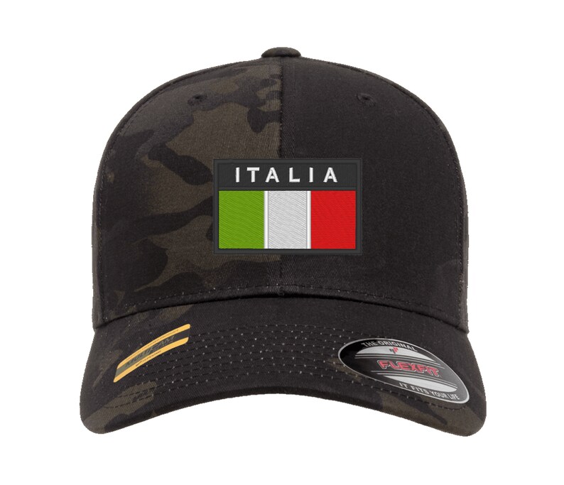 May include: Black camouflage baseball cap with a black patch featuring the Italian flag and the word "ITALIA" in white text.