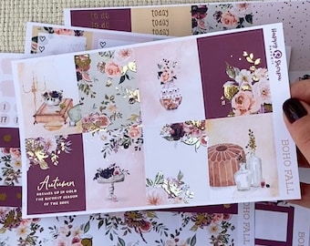 May include: A collection of Boho Fall themed planner stickers. The stickers feature floral designs in burgundy, blush, and gold. Some stickers have text that reads "Autumn" and "today".