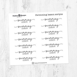 May include: A sheet of white stickers featuring the words "swimming lesson" in a cursive script. The stickers are arranged in a grid pattern. The Happy Sherpa Paperie logo and Instagram handle are also visible.