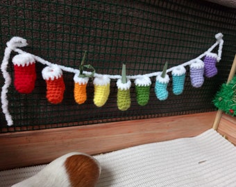 Christmas garland in cage for guinea pig! Advent calendar for guinea pig!