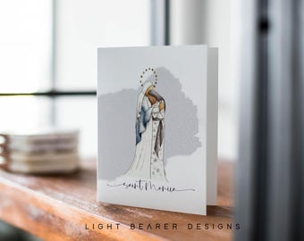 May include: A watercolor illustration of Saint Monica, a Catholic saint, with her son Saint Augustine. The image is on a white card with the words "Saint Monica" written in cursive at the bottom.