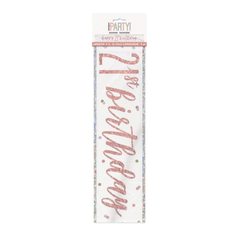 May include: A white banner with rose gold text that reads "21st Birthday." The banner is 9 ft. long and has a glittery border and confetti accents. The top of the banner has the text "Happy 21st Birthday."