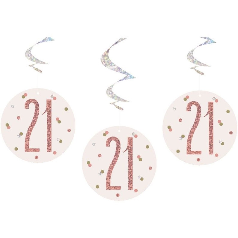 May include: Three pink and white hanging decorations with a rose gold glitter 21 on each. The decorations are perfect for a 21st birthday party.