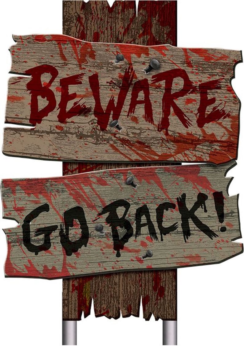 May include: A vertical wooden post featuring two horizontal, weathered, light brown wooden signs attached with dark metal nails. The top sign displays the red text BEWARE, and the bottom sign displays the black text GO BACK!, both with red blood-like splatters.