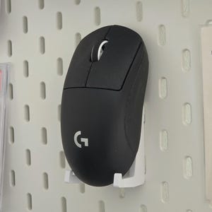 May include: A set of three ceramic mugs with a speckled, matte finish. The mugs are in shades of cream, light gray, and dark gray. Each mug has a simple, minimalist design, perfect for coffee or tea.