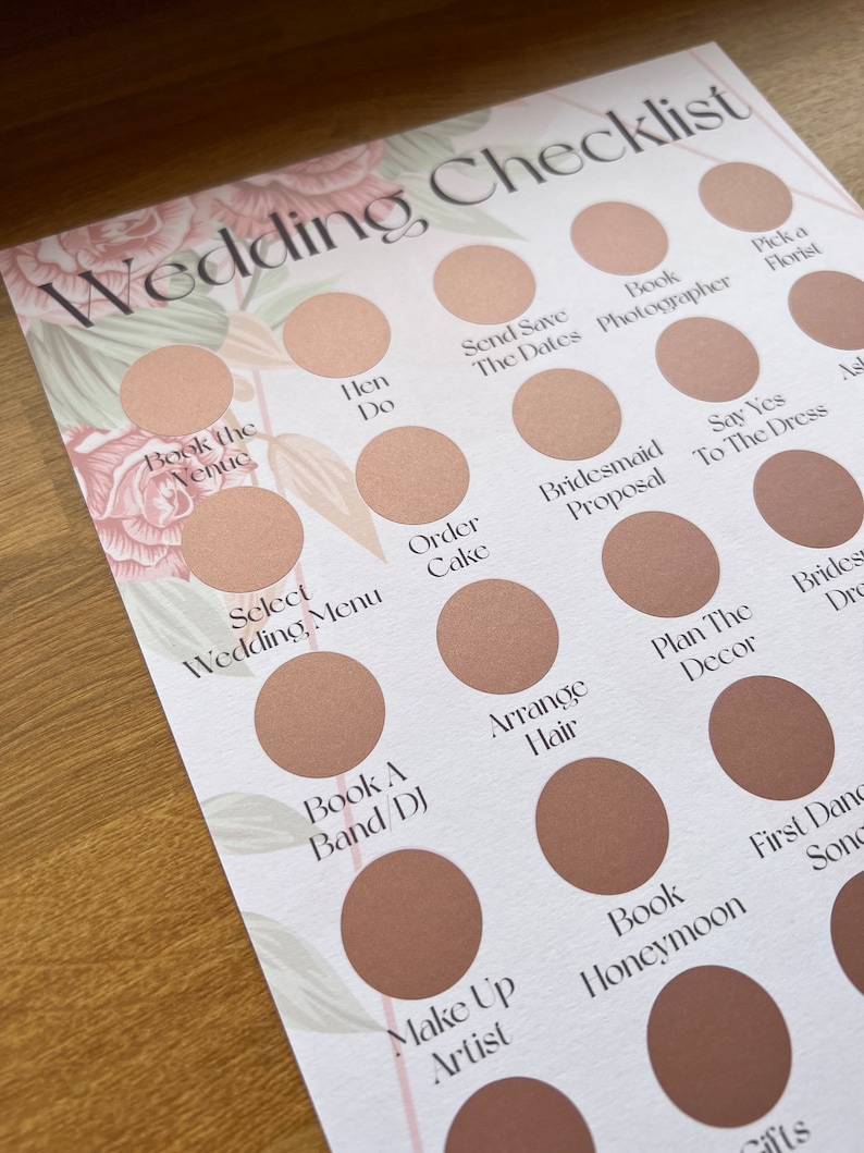 May include: A wedding checklist with a floral design. The checklist includes tasks such as booking the venue, sending save the dates, ordering the cake, and arranging hair.