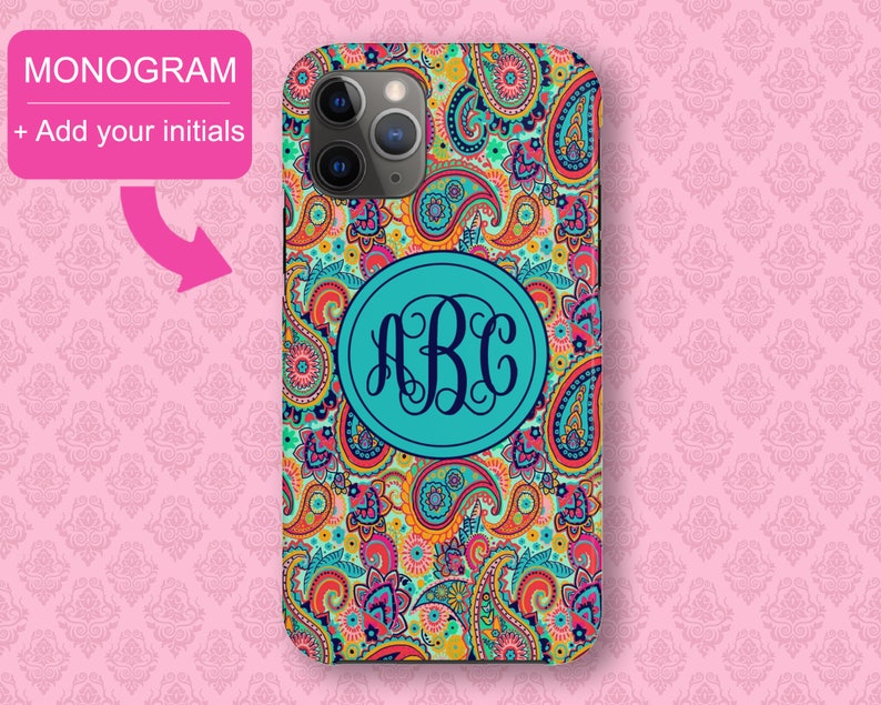 May include: A colorful paisley phone case with a turquoise circle monogrammed with the letters "ABC".