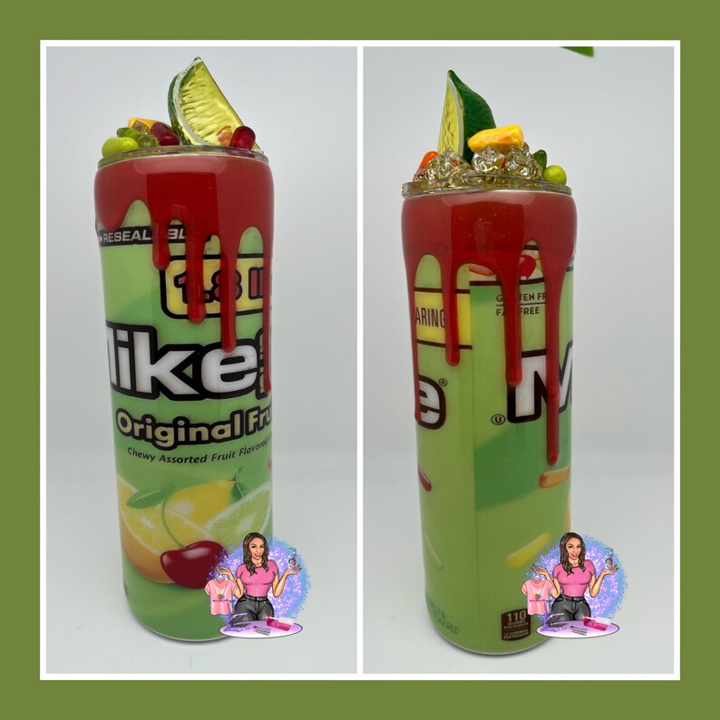 May include: A green and white tumbler with the text "Like" and "Original Fruit". The top is decorated with red drips, fruit, and a lime wedge. The tumbler is designed to resemble a candy container.