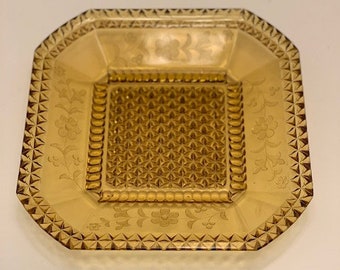 Plaque en verre ambré antique motif Adams Wildflower vers les années 1800 9,75"