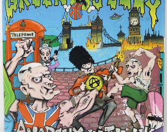 Vinilo sencillo de 12" de Zoo Entertainment Green Jelly - Anarchy In The UK, edición de 1993 (años 90), con póster desplegable a color. Estilo retro.