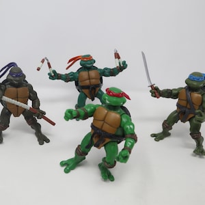 Lot de pièces d'armes figurines Teenage Mutant Ninja Turtles Vintage TMNT