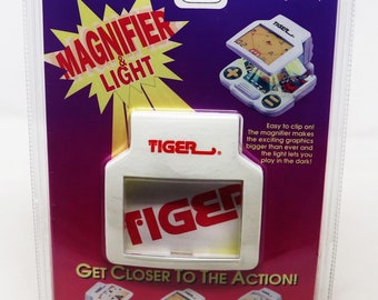 Tiger Electronics LCDゲーム　MAGNIFIER&LIGHT 1995 Tiger Electronics Lights Out Handheld Game Tested - Etsy