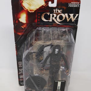 Vintage 1999 McFarlane Toys 90s Movie Maniacs 2 The Crow Eric Draven 7" Figura de ação MOC rara em cartão (Brandon Lee)