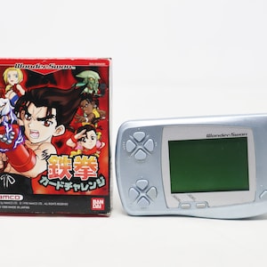 Videojuego de mano Bandai Wonder Swan WonderSwan azul claro metalizado vintage de 1998 y 90 + cartucho de desafío de tarjeta Tekken de 1999 en caja japonesa