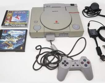 Consola Sony Playstation 1 PS1 Pal vintage SCPH-7502 completamente  funcional, controladores de tarjeta de película Gamars VCD no funciona  paquete de lote de 2 juegos -  México