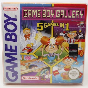 以下が含まれることがあります： ゲームボーイギャラリーのビデオゲームカートリッジ。箱には「GAME BOY GALLERY」と「5 GAMES IN 1」の文字が入ったカラフルな漫画のグラフィックが描かれています。任天堂のロゴが箱に表示されています。