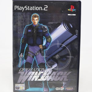 May include: PlayStation 2 video game case with a black background and a blue and silver image of a man holding a gun. The game title is "Operation WinBack" and the game is rated 11+ by the ESRB.