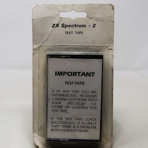 Vintage ZX Spectrum +2 Test Tape Kassette Band Bei Problemen beim Laden von Videospiel Software MOC Kardiert Versiegelt Retro Selten